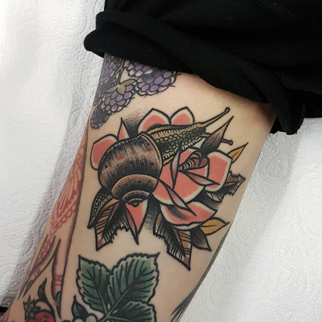 Snail and rose by @rabtattoo