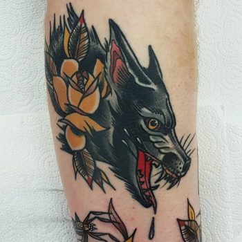 Trad wolf by @rabtattoo