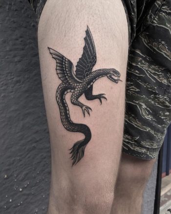 Winged serpent by @justinoliviertattoo