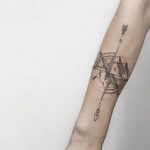 Compass and mountains by @isaarttattoo