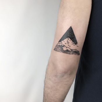 Mountain and waves by @isaarttattoo