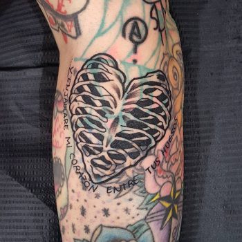 Rib heart by @isaarttattoo