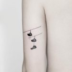 Shoes on a wire tattoo by @mateutsa