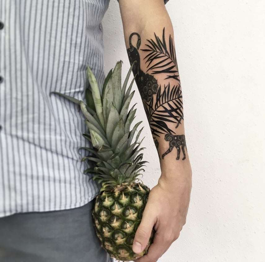 Meri Meri pineapple and palm leaves tattoos 