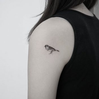 Tiny bird by tattooist Ian Wong