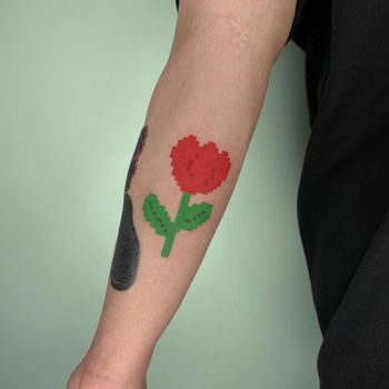 Red pixel tulip tattoo by @88world.co.kr