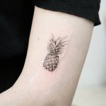 Mini pineapple by tattooist Ian Wong