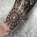 Blackwork Mandala on a Forearm by tattooist Arang Eleven