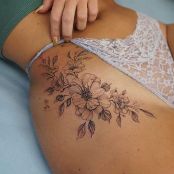 Floral Piece On The Right Hip by @wolfgang-tattoo