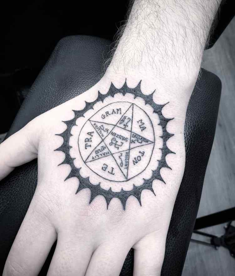Black Buttler Tattoo On A Hand by @kamelschwestertattoo