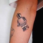 Chrome Lego Man Tattoo by @shooin.tattoo