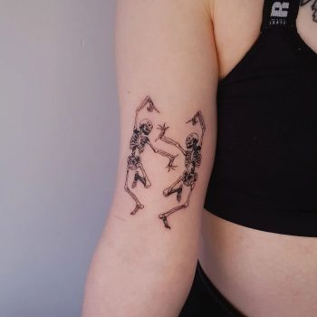 Dancing skeletons tattoo by @gytamara_tattoo