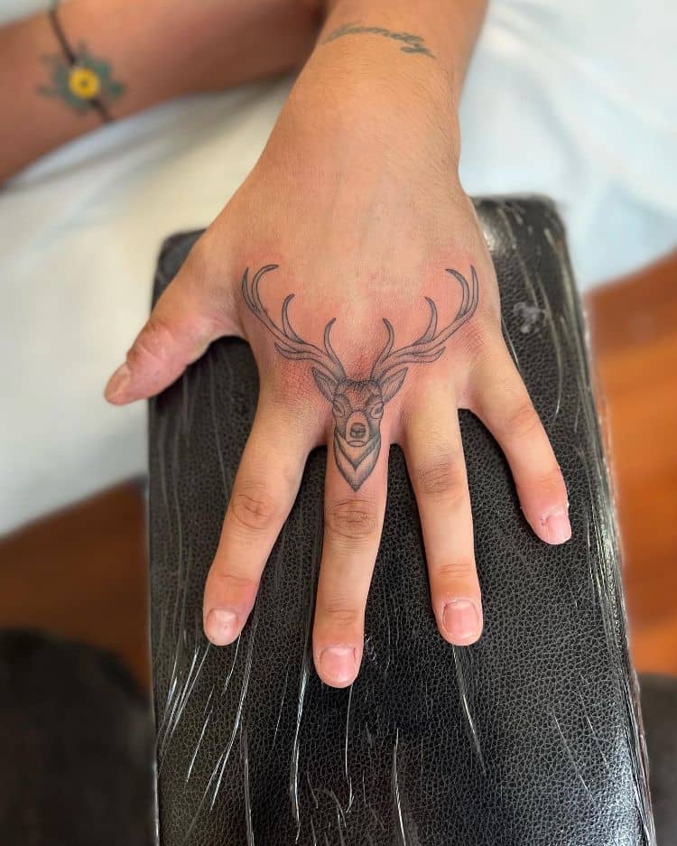 Deer finger tattoo by @inkxiety_