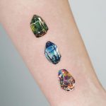 Familys Birthstone Peridot Aquamarine Opal tattoo by @jooa_tattoo