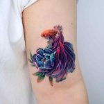 Hyper-Realistic Betta Fish and Tulip Tattoo by @non_lee_ink