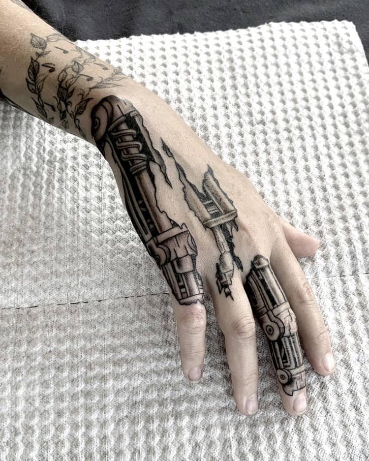 Cyborg hand tattoo