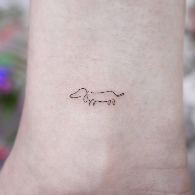 Simple Minimalist Dachshund Tattoo by @tattooist_namoo - Tattoogrid.net
