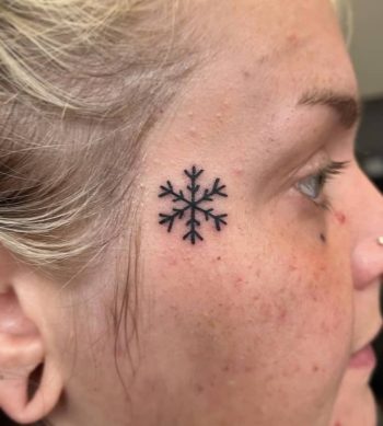 Snowflake Face Tattoo by @lovecats_tattoo