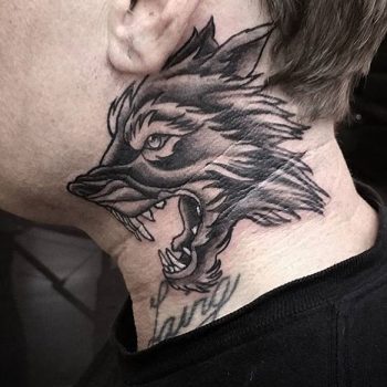 Wolf tattoo on a neck by @one_shot_tattoo
