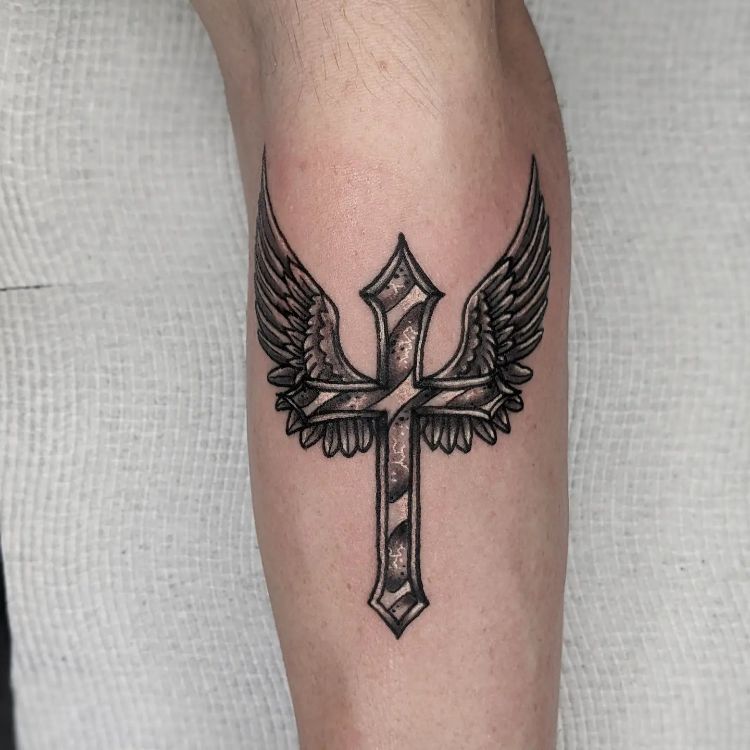 Black And Grey Cross Tattoo by @tiaani.riches_tattoos