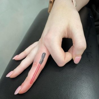 Lightsaber Tattoo Finger by @libbyguytattoos