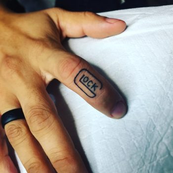 Small Glock Symbol Tattoo by @tattoojulian80