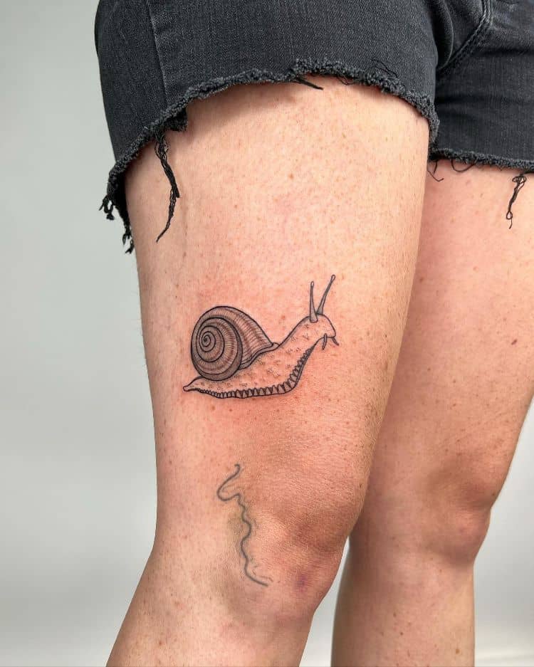Small Snail Tattoo by @noelle_adrienne