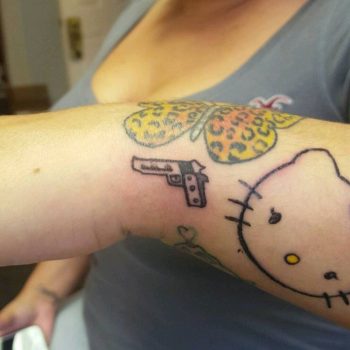 Tiny Gun Tattoo by @brennen_semple