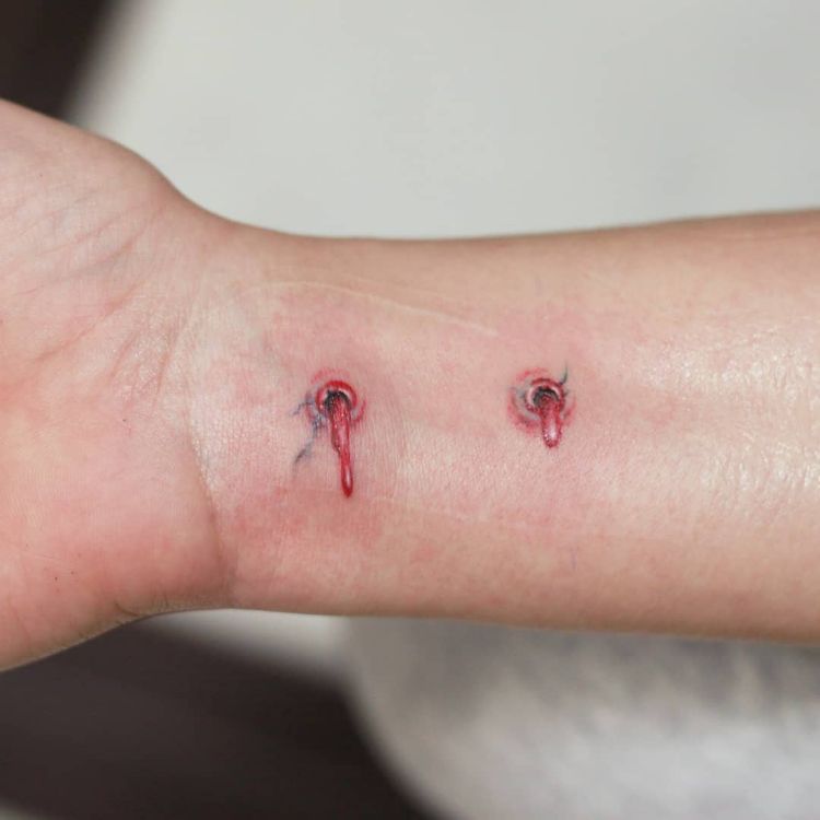 Vampire Bite Mark Tattoo by @alexey_bachinsky