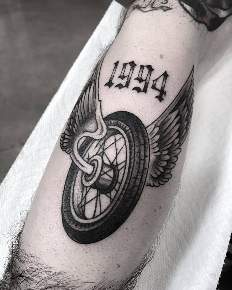 Wheel And Wings Tattoo by @death_cloak