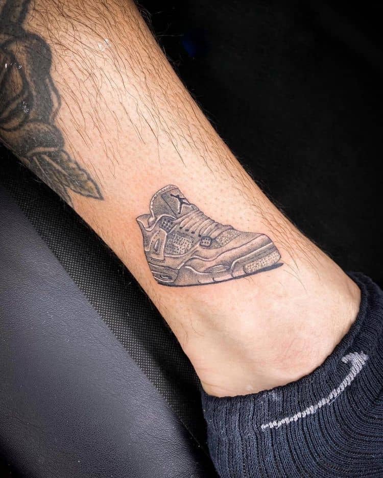 Air Jordan 4 Tattoo by @oribs_tattooer