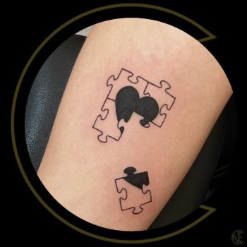 Broken Heart Puzzle Piece Tattoo by @once_piercing