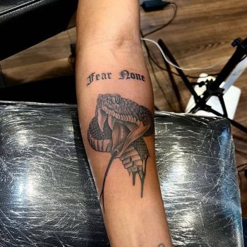Fear None Tattoo On Arm by @cajun_ink_tattooz