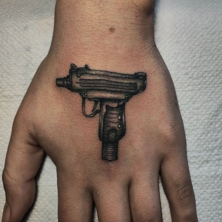 Gangster Gun Tattoo On Hand by @samttsm