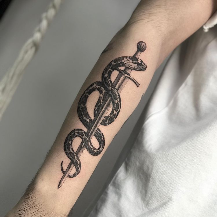 Snake With Sword Tattoo by @mas_tattoos_ 