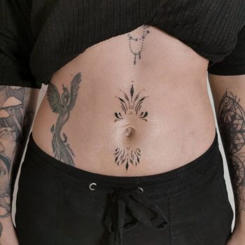 Tribal Belly Button Tattoo by @enoki.ink