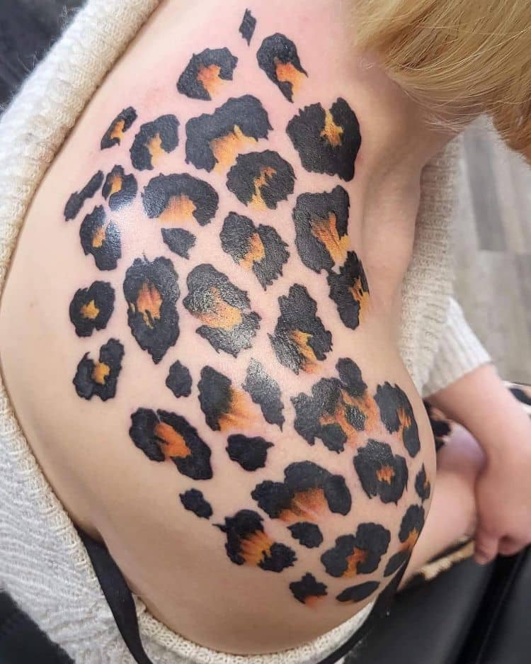 Leopard Print Shoulder Tattoo by @emmawillistattoos
