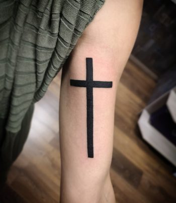 Solid Black Cross Tattoo by @uzunovtattoo