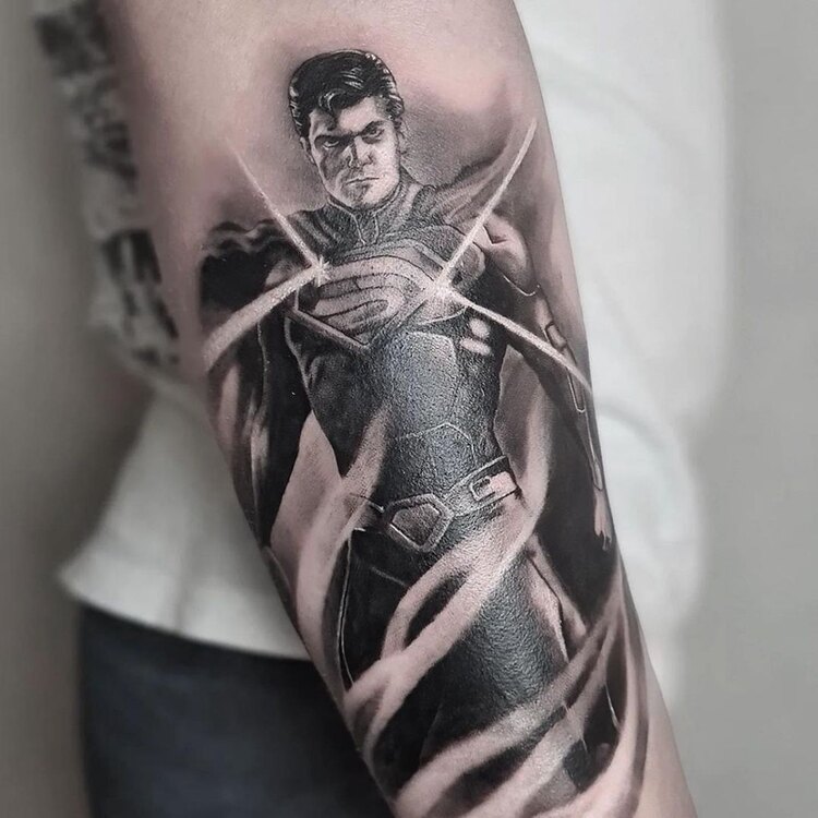 Realistic superman tattoo design by @oslo.tattoo.ink_